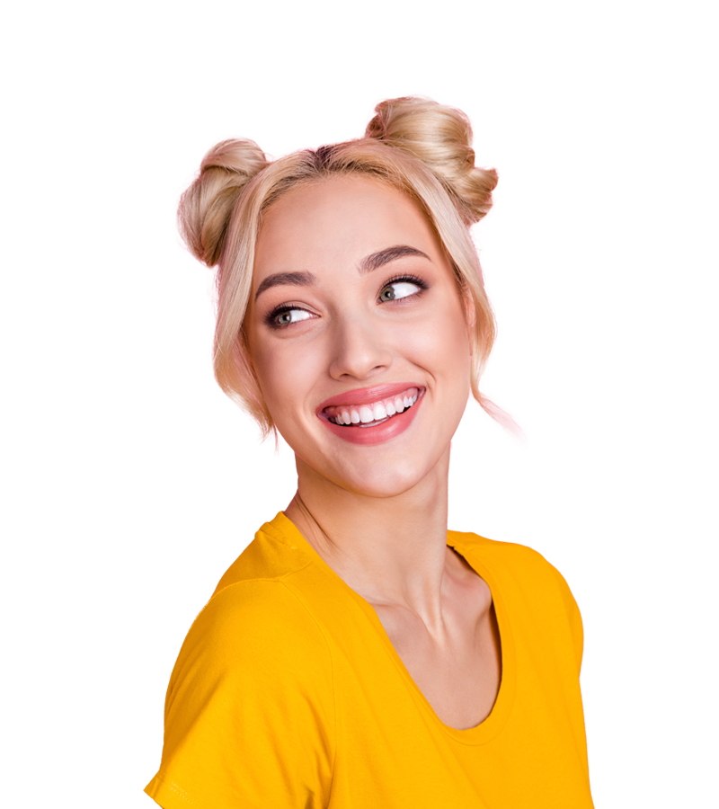 Formada-penelope A young woman in yellow smiles while looking over her right shoulder