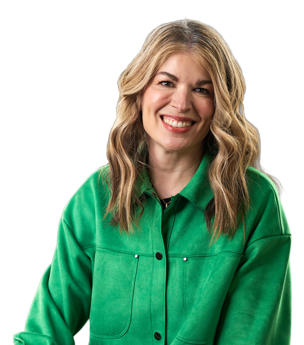 Meghan Kelly, Co-founder and CEO, wearing a green jacket, smiles looking at the camera